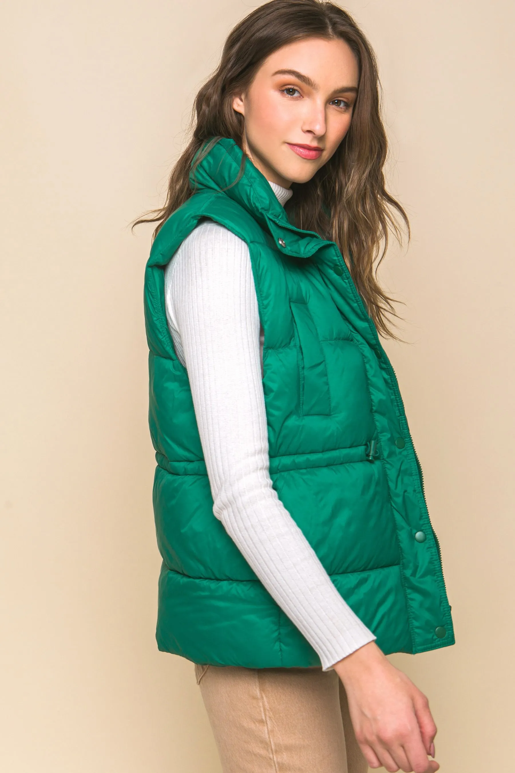 Women's Color Zip up button puffer vest with waist toggles