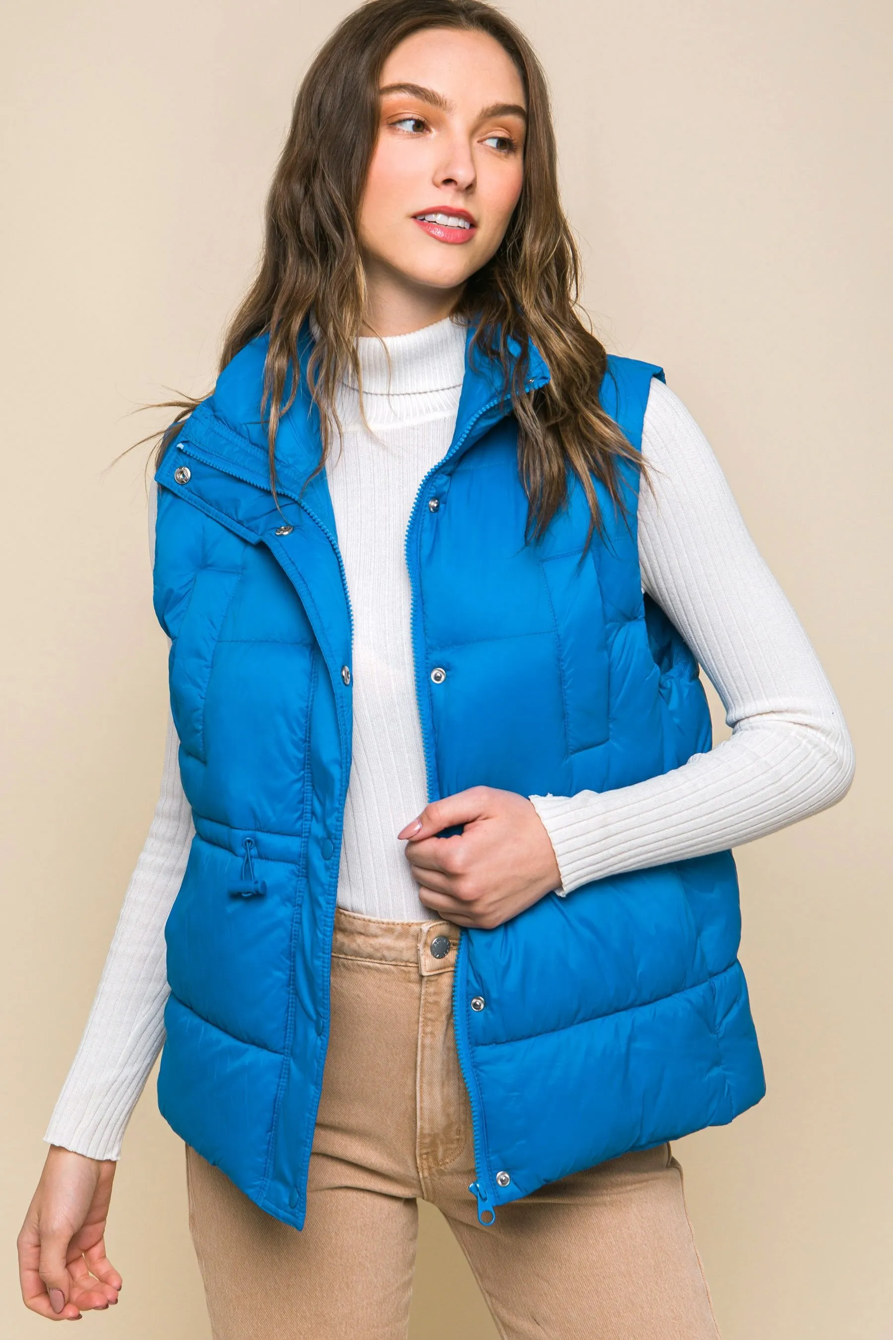 Women's Color Zip up button puffer vest with waist toggles